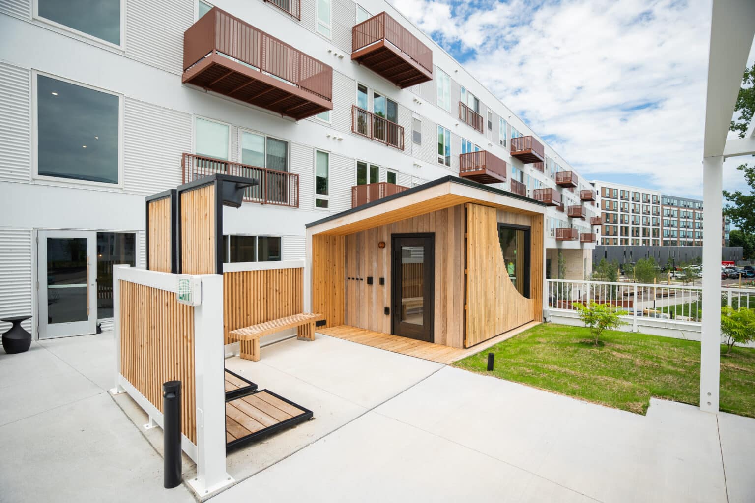 Elevated Apartment Living with Modern Outdoor Sauna | Esox House ... - Luxury Apartment Building Saunas